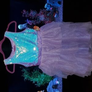 Girls dress purple size 10 plus.